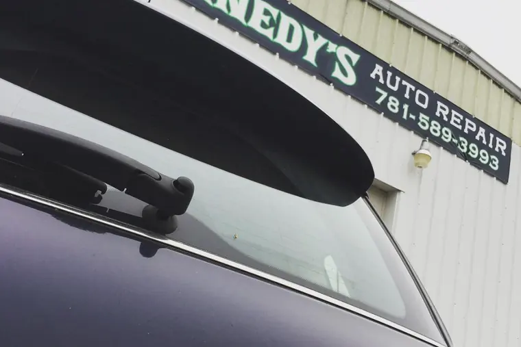 Kennedy's Auto Repair sign with the phone number 781-589-3993